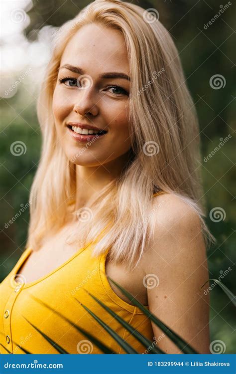 Close Up Vertical Portrait Of Happy Beautiful Luxurious Blonde With