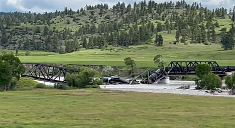 Train Carrying Hazardous Material Plunges From Collapsed Bridge Into