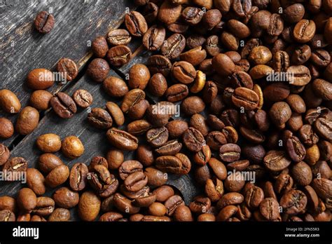 Coffee beans close up background Stock Photo - Alamy