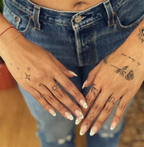 Hand And Finger Tattoos Pretty Hand Tattoos Finger Tattoo For Women