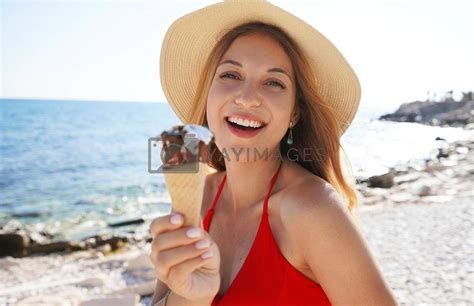 Close Up Of Beautiful Bikini Woman With Hat Holding Eating Ice Cream Cone Italian Gelato On The