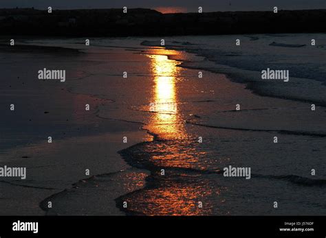 reflection   beach stock photo alamy