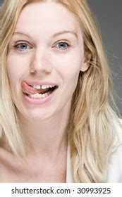Blonde Woman Licking Her Lips Something Stock Photo Shutterstock