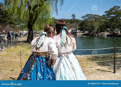 Korean Girls Dressed Hanbok In Traditional Dress Walking At Namsan ...