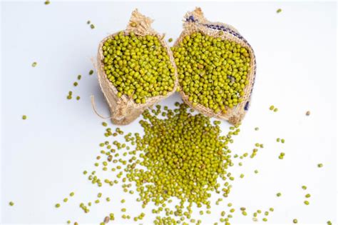 Premium Photo Green Gram Or Mung Bean In Bag Over White Background