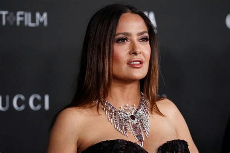 Salma Hayek, 55, shares stunning new swimsuit photos to usher in 2022