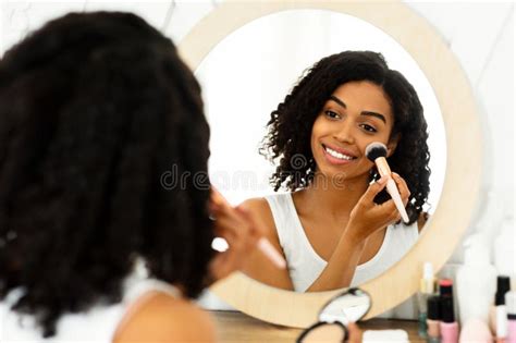 Nude Makeup Smiling Black Girl Applying Blush On Cheeks With Brush Stock Image Image Of