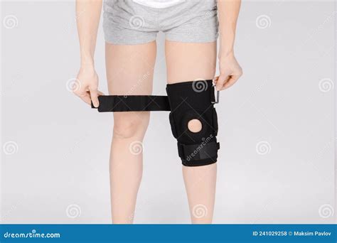 Knee Support Brace On Leg On White Background Elastic Orthopedic