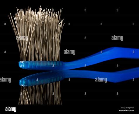 Toothbrush With The Bristles Made Of Metal Wires Stock Photo Alamy