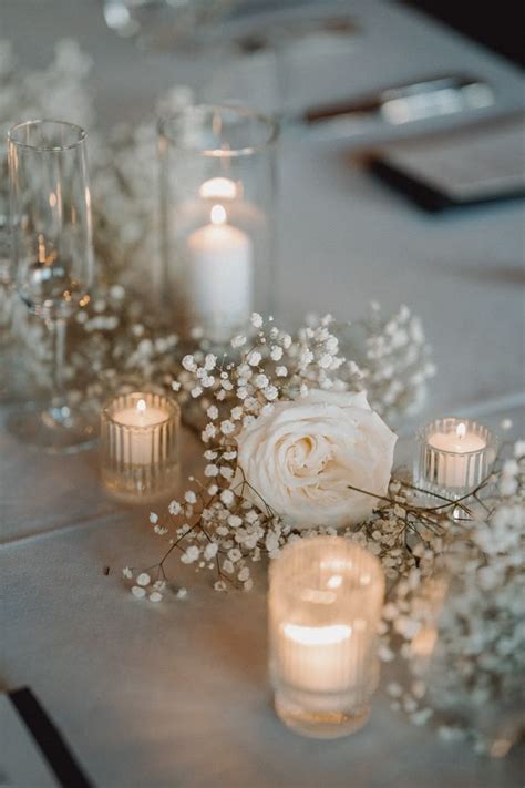 simple modern wedding centerpieces babys breath flowers roses