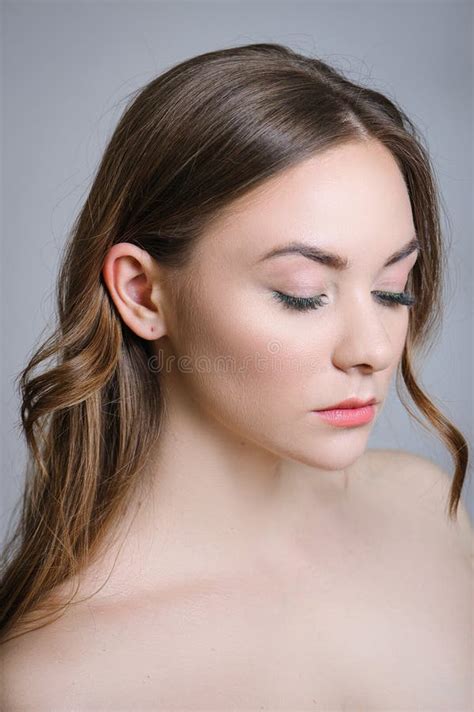 Beautiful Adult Girl Posing With Nude Makeup With Clean Skin And Care Her Skin Stock Photo