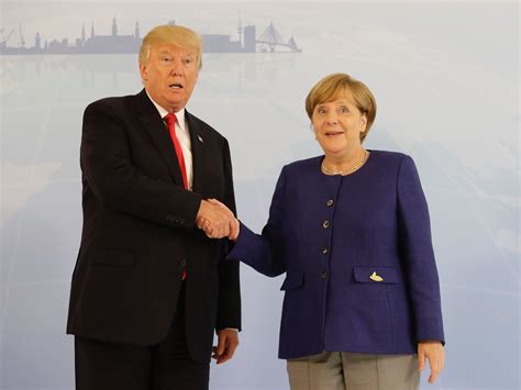 Trump and Merkel pose for awkward photos, handshake before G20 summit ...