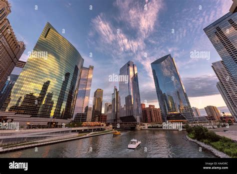 Chicago Downtown And Chicago River With Bridges During Sunset Stock