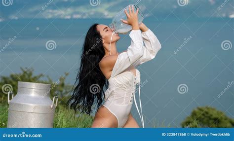 Woman In Lingerie On Farm Girl Drink Milk From Bottle Woman Drink Raw Milk At Countryside
