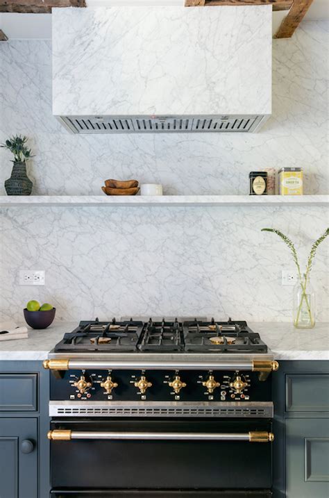 The Marble Hood Blending Into The Kitchen Wall Is Just The Subtle Touch