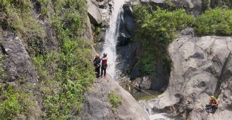thrilling waterfall canyoning adventure  stock video footage