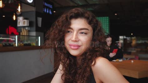 Beautiful Brunette Woman Portrait With Curly Hair In Cafe Stock Footage Video Of Outdoors