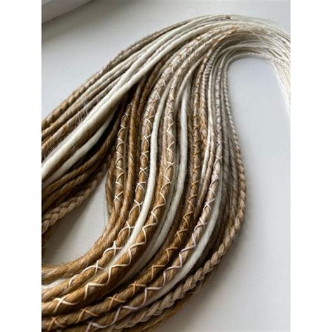 From Frizzy to Fabulous: Mastering the Art of Smooth Dreads at Home