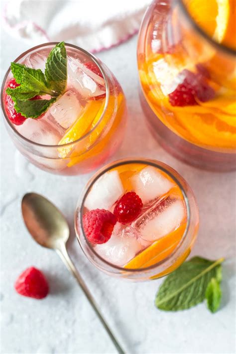 Rosé Sangria With Oranges And Raspberries Simply Whisked