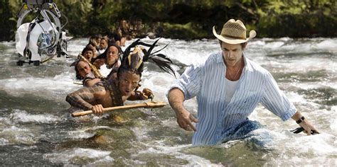 Mel Gibson leads the actors in "Apocalypto" across a river ...