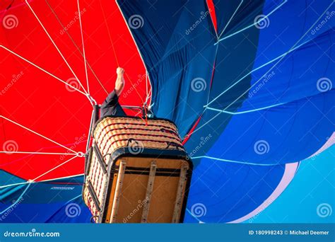 Hot Air Balloon Pilot Soaring Above In The Sky Editorial Stock Photo Image Of Event