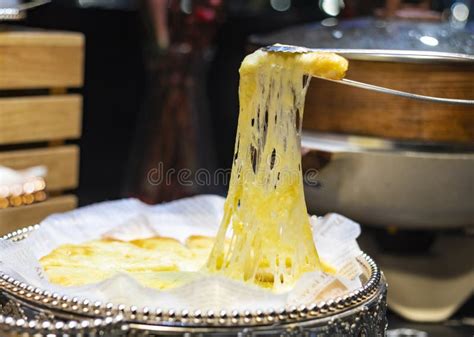 Use Tongs To Pick Up The Brushed Durian Pizza Stock Image Image Of