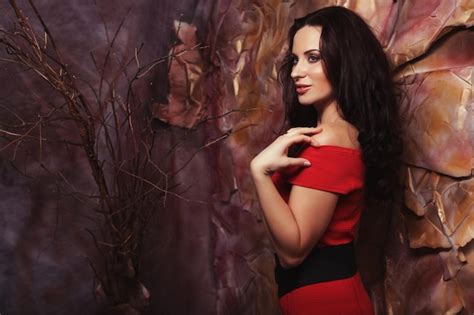 Premium Photo Sensual Beautiful Brunette Woman Posing In Red Dress Art And Fa