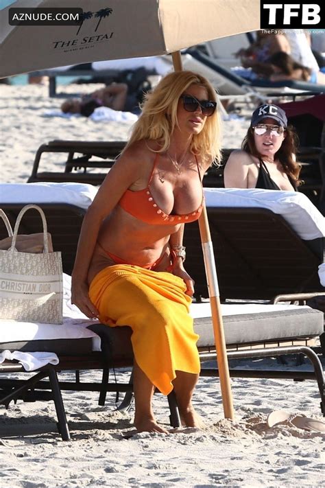 Victoria Silvstedt Lounges Beachside In Miami In An Orange Two Piece Bikini AZNude