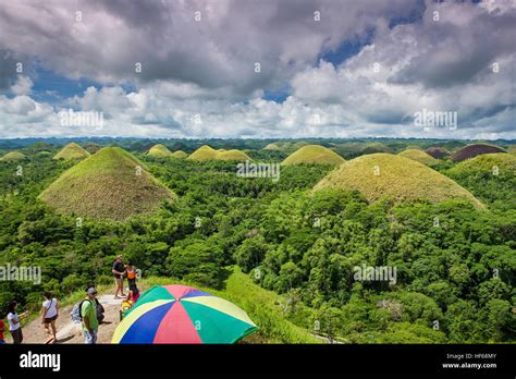 Tourists view the Chocolate Hills of Bohol Island, Philippines Stock ...