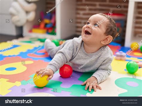 Adorable Hispanic Baby Playing Balls Lying Stock Photo 2250973449