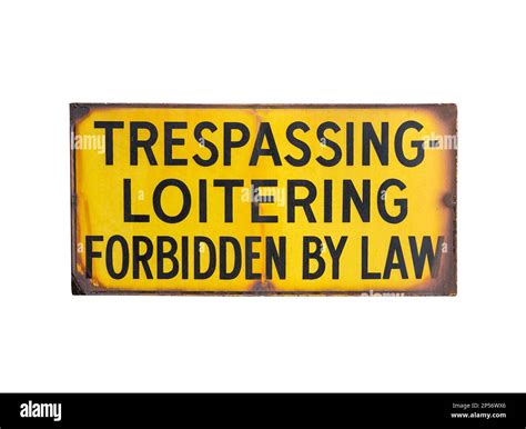 Rusty Old Trespassing And Loitering Forbidden By Law Sign Isolated