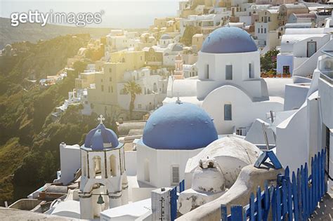 Famous Three Blue Domes In Oia Village Santorini Greece