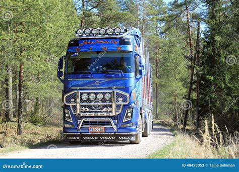 Blue Volvo FH16 750 Timber Truck On Forest Road Editorial Stock Photo