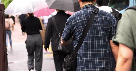 A Slow Motion Of Walking People At The City Street In Tokyo Telephoto