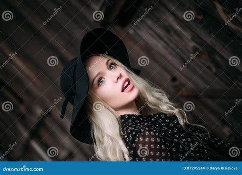 Beautiful Attractive And Stylish Girl Wearing Black Hat Standing Posing In City Nude Makeup