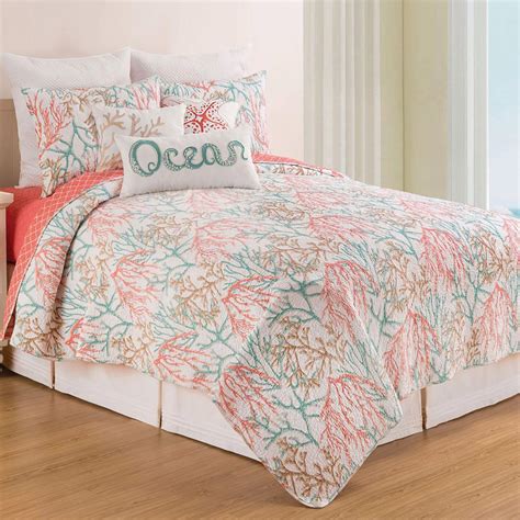 A Soft Pastel Coral Pattern Graces This Beach Bedding Twin Quilt