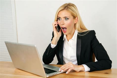 Portrait Of A Modern Pretty Blonde Office Woman In A White Shirt And Black Jacket Premium AI