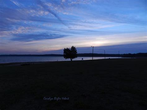 Sunrise on Lake Tyler in East Texas Photograph by Carolyn Hebert