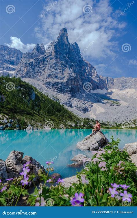 Men Visiting Lago Di Sorapis In The Italian Dolomitesblue Lake Lake