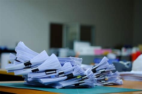 Premium Photo Close Up Of Papers On Table