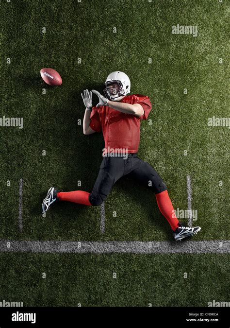 Football Player Laying On Field Stock Photo Alamy