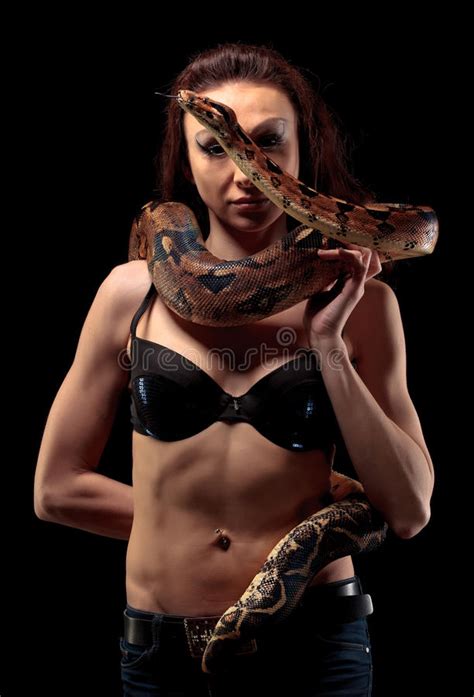 A Lovely Blonde Model Poses Nude With A Boa Snake In A Studio Environment Stock Photo Image Of