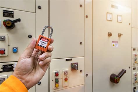 Premium Photo Red Key Lock And Tag In Hand For Process Cut Off