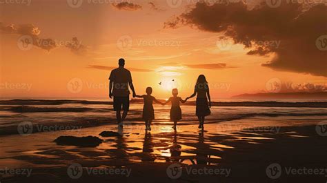 Family silhouette playing on the beach at sunset 27447293 Stock Photo at Vecteezy