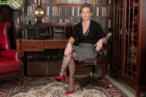 Stockings Clad Luxurious Looking Blonde MILF Showing Off Her Body IamXXX