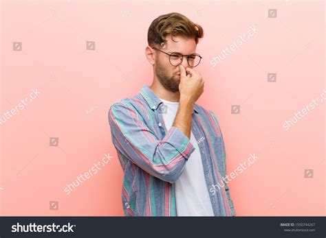 5349 Smells Bad Man Holding Nose Images Stock Photos And Vectors