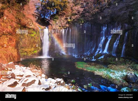 Rainbow and snow at Shiraito Falls in winter Stock Photo - Alamy