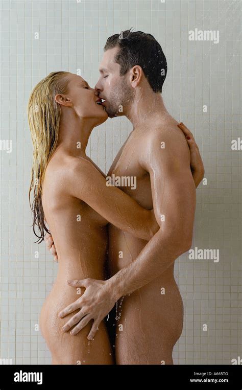 Naked Couple Embracing In Shower Stock Photo Alamy