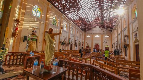 Sri Lankans remember Easter bomb victims at home amid virus | CTV News