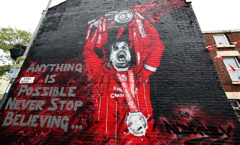 New Jordan Henderson Trophy Celebration Mural Unveiled At Anfield